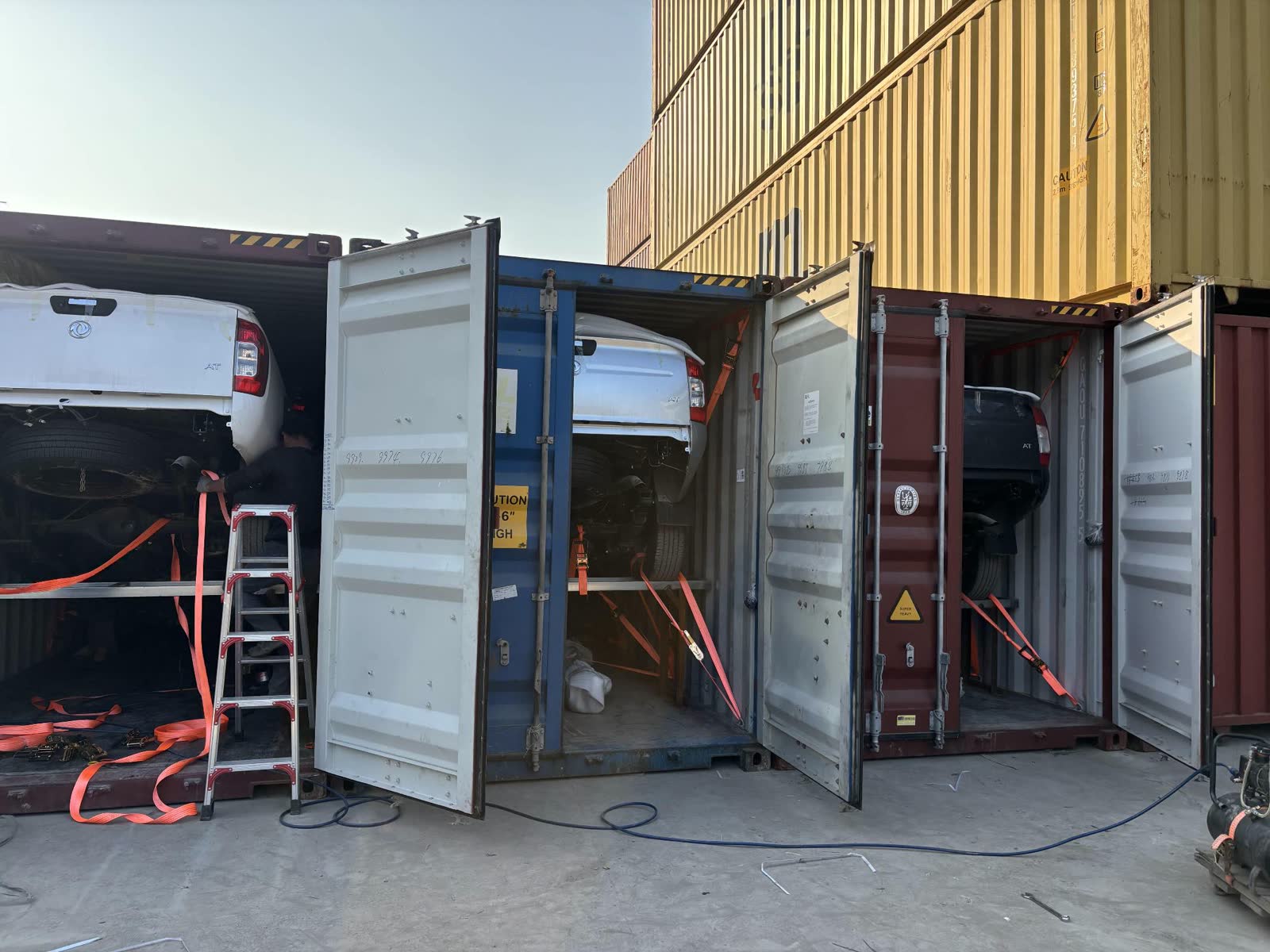 Cars & 4x4s in containers