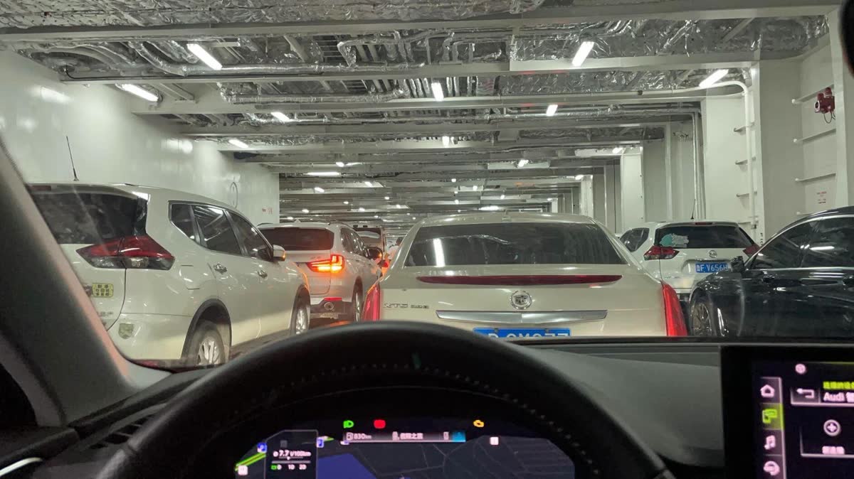 Cars parked in rows on the vehicle deck of a RoRo vessel